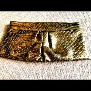 Gold / Bronze Style & Co. clutch purse.